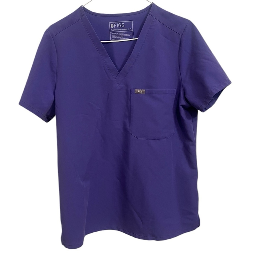 Lilac limited color FIGS Technical Collection Catarina one pocket scrub top.
